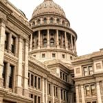 Exterior view of the Texas Capitol, showcasing its historic and architectural grandeur.